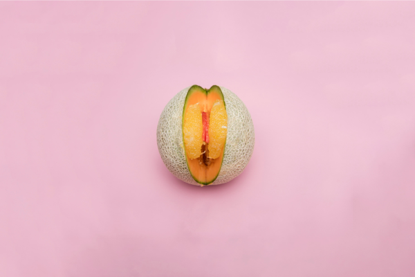 Image of an open citrus fruit representing a woman's vagina and vulva because many women wonder if their vagina is normal.